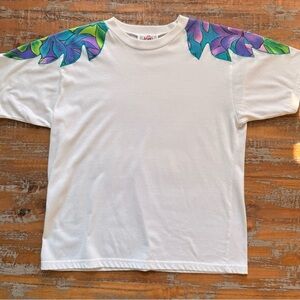 Vintage 90s CA Sport white tshirt with floral leaf design on sleeves.